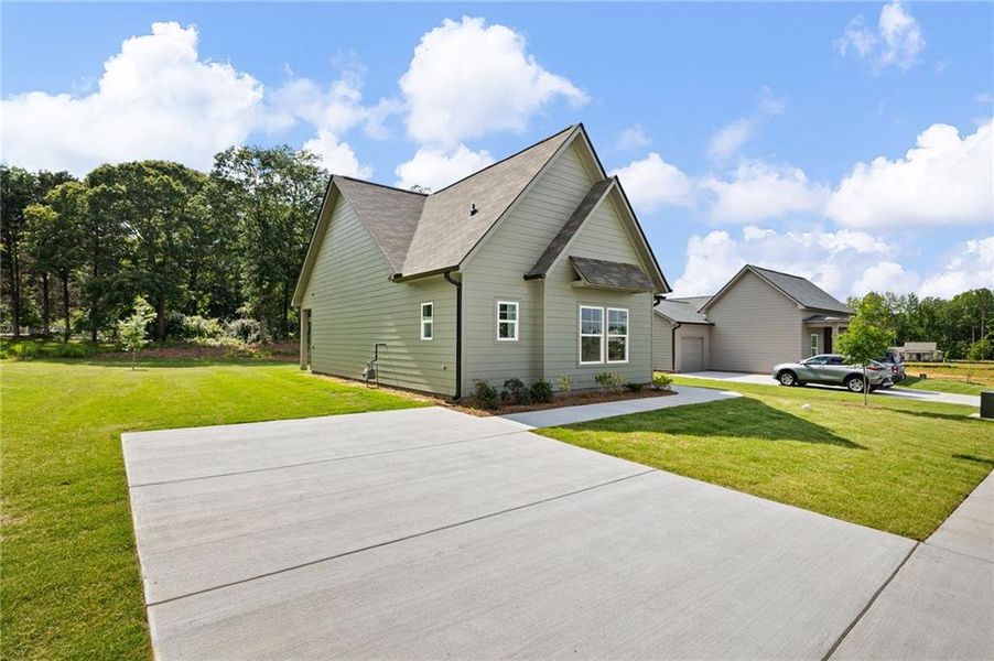 Front exterior of a new home in , Carrollton, GA, highlighting curb appeal (Image 2). Front exterior of a new home in , Carrollton, GA, highlighting curb appeal (Image 2).