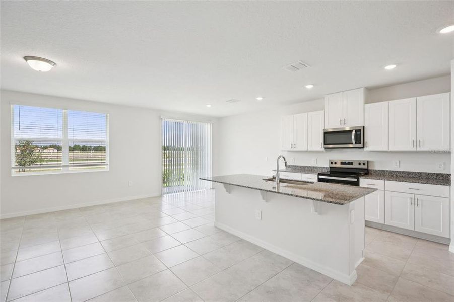 Furnished interior view inside a new home in Villamar - Signature Series, Winter Haven (Image 11).