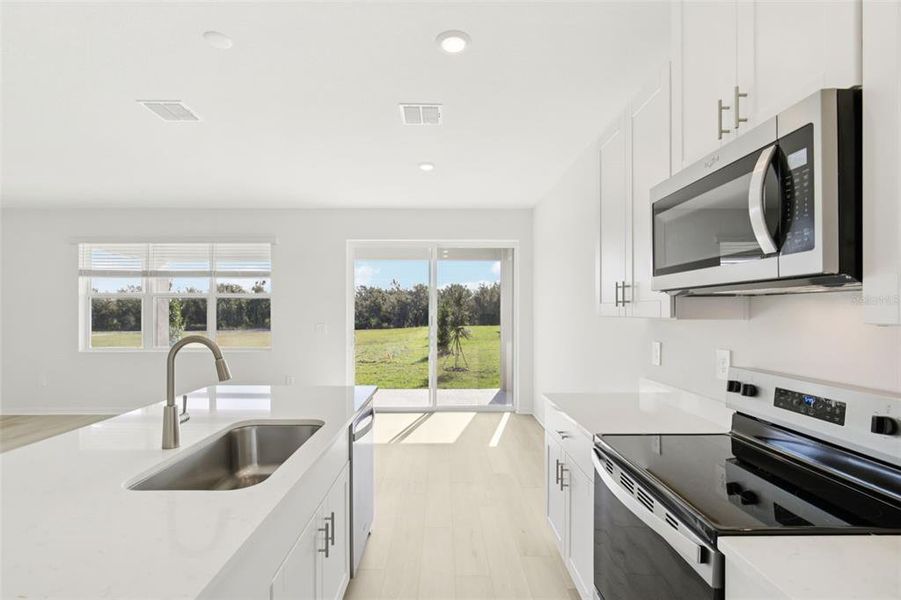 Furnished interior view inside a new home in Coasterra - Reserve Series, Palmetto (Image 9).