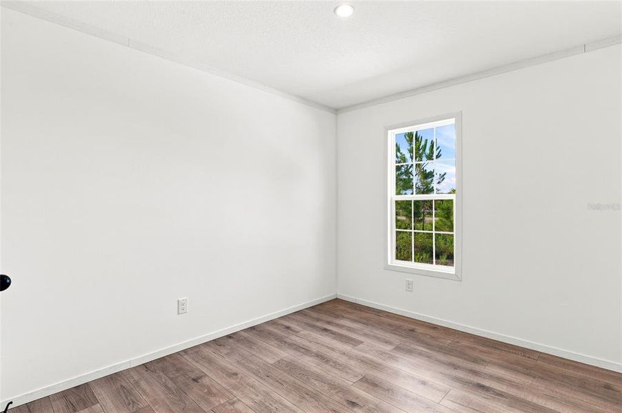 Spacious, unfurnished interior of a new home in , Okeechobee (Image 26).