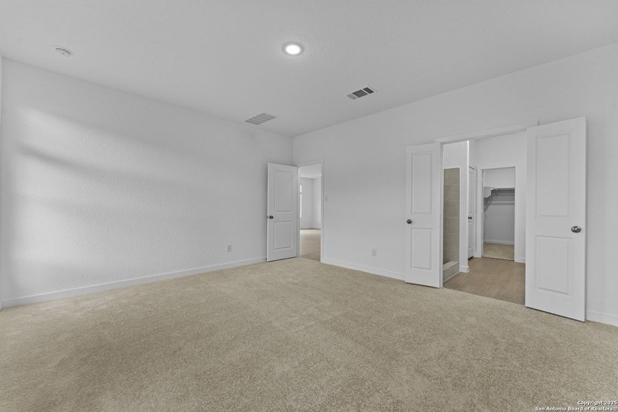Spacious, unfurnished interior of a new home in Waterwheel: Coastline Collection, San Antonio (Image 13).