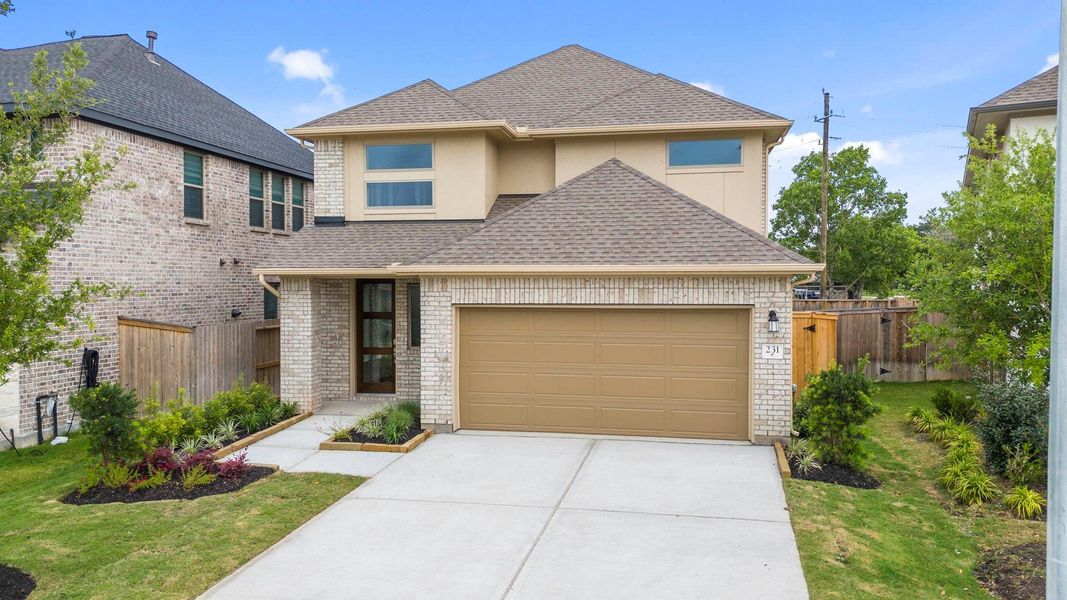 Front exterior of a new home in Candela, Richmond, TX, highlighting curb appeal (Image 1). Front exterior of a new home in Candela, Richmond, TX, highlighting curb appeal (Image 1).
