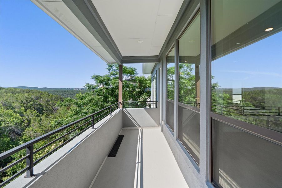 Capture breathtaking views from this private, elevated terrace, perfect for serene mornings or evening relaxation. Capture breathtaking views from this private, elevated terrace, perfect for serene mornings or evening relaxation.