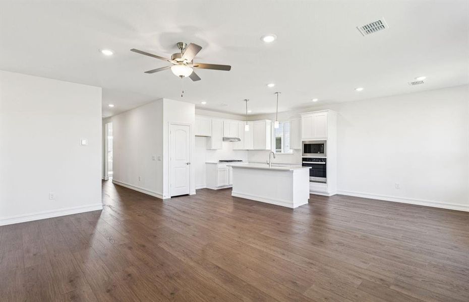 Open kitchen with adjoining nook Open kitchen with adjoining nook