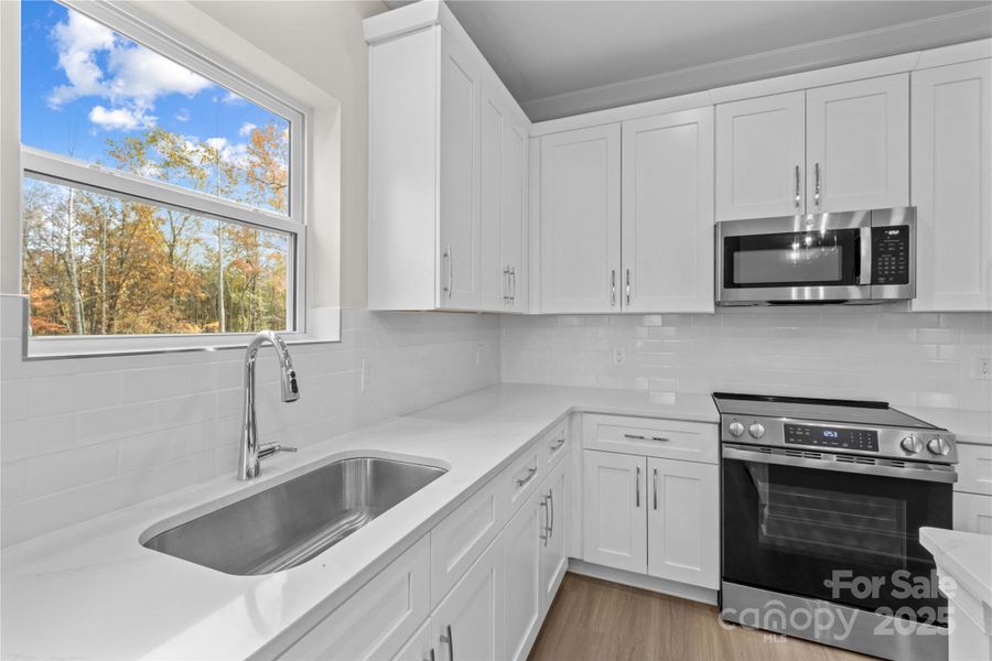 Furnished interior view inside a new home in , Statesville (Image 15).