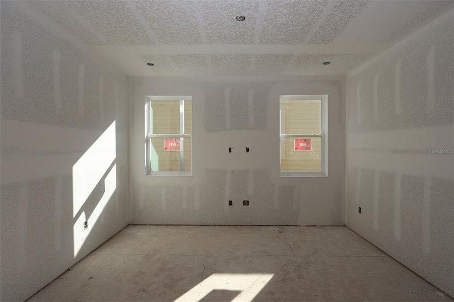 In-progress construction of a new home in Lake Star at Ovation, Winter Garden, FL (Image 14).