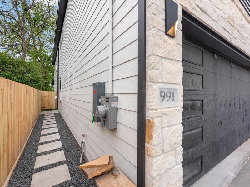 Exterior details and patio area of a home in , Houston (Image 3).
