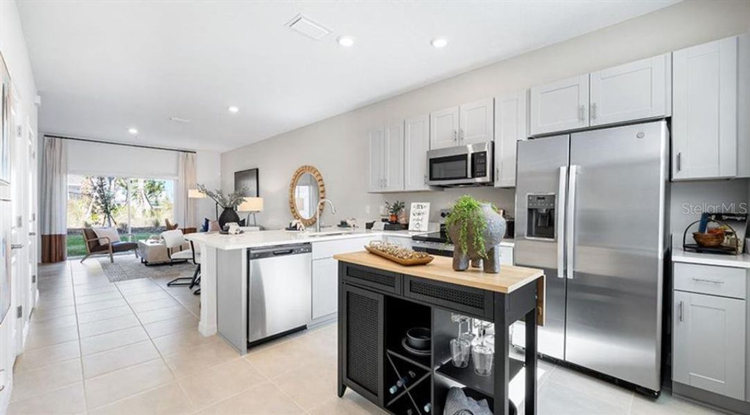 Furnished interior view inside a new home in The Townhomes at Westview, Kissimmee (Image 6).