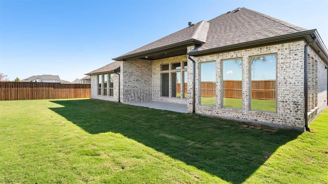 Exterior details and patio area of a home in North Sky 65', Celina (Image 2). Exterior details and patio area of a home in North Sky 65', Celina (Image 2).