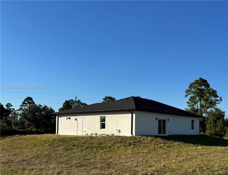 Exterior details and patio area of a home in , Lehigh Acres (Image 3).