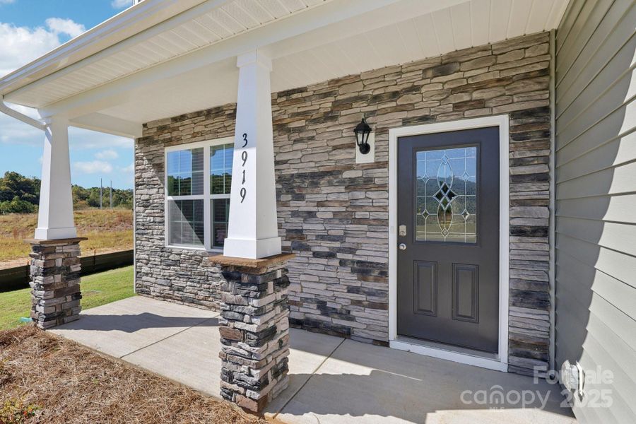 Exterior details and patio area of a home in Cline Village, Conover (Image 2).