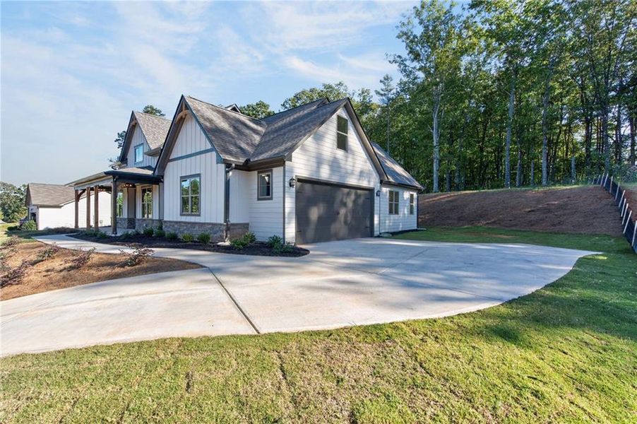 Front exterior of a new home in , Dawsonville, GA, highlighting curb appeal (Image 23).