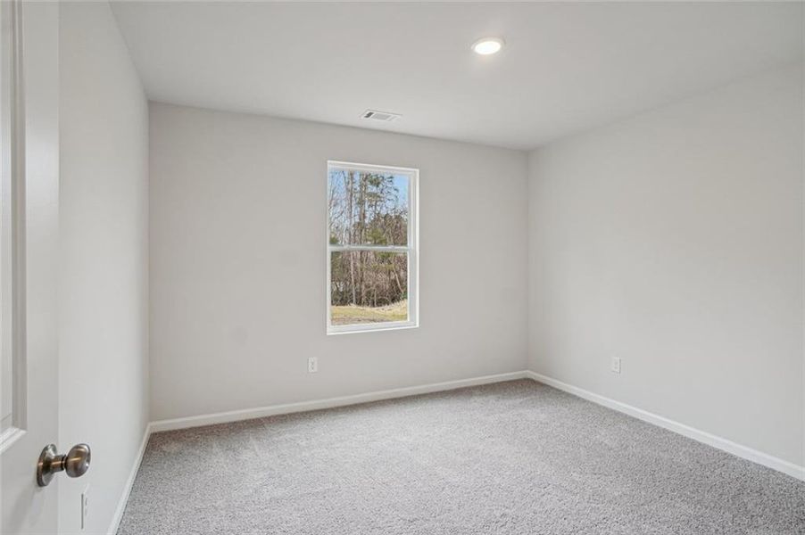 Spacious, unfurnished interior of a new home in Arrowhead By The Lake, Lizella (Image 19).