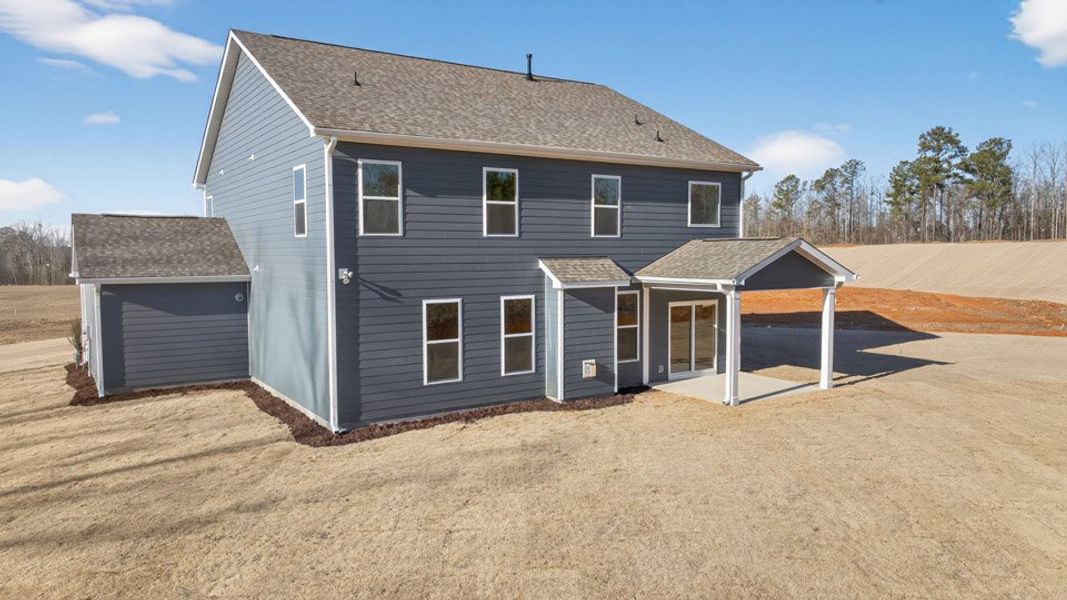 Exterior details and patio area of a home in The Manors at Winston Pointe, Clayton (Image 4).