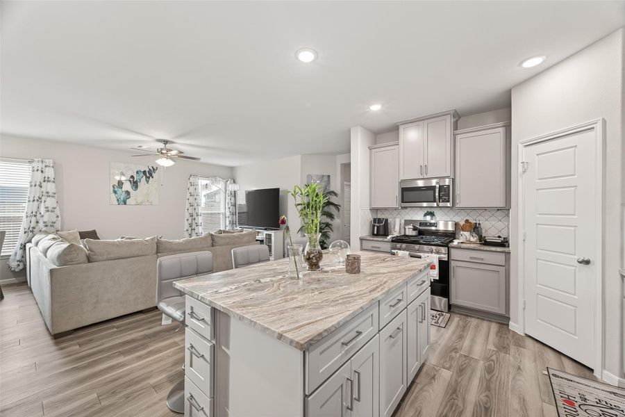 Furnished interior view inside a new home in Sunterra, Katy (Image 35).