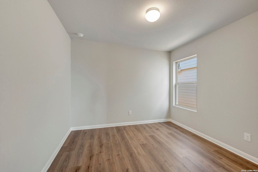Spacious, unfurnished interior of a new home in Mesquite Ridge, San Antonio (Image 28).
