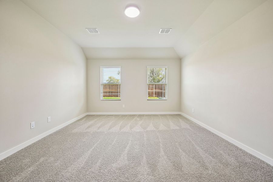 Primary Bedroom in the Harrison home plan by Trophy Signature Homes