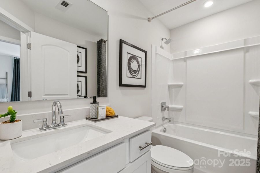 Furnished interior view inside a new home in , Huntersville (Image 26).