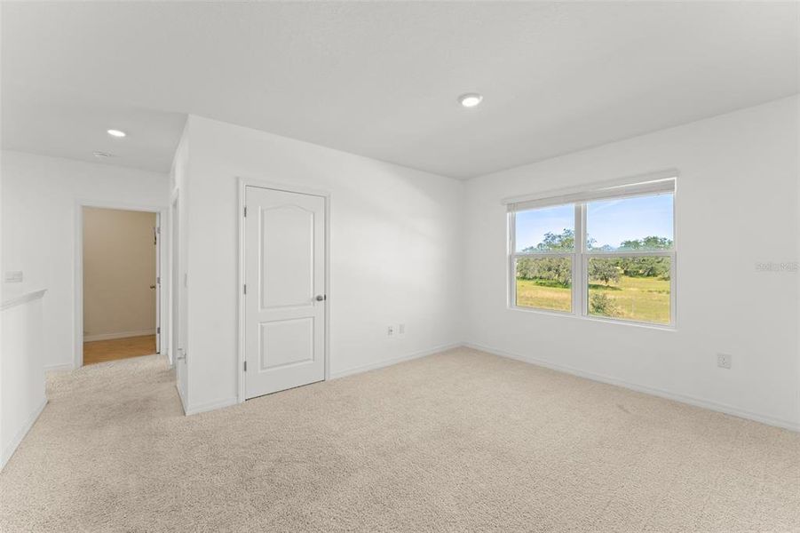 Spacious, unfurnished interior of a new home in Grace Ranch, Haines City (Image 28). Spacious, unfurnished interior of a new home in Grace Ranch, Haines City (Image 28).