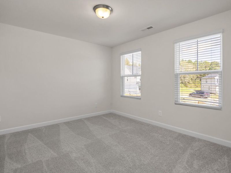 Spacious, unfurnished interior of a new home in Wellers Knoll, Lillington (Image 26).