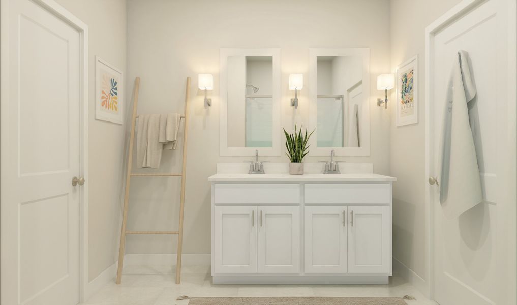 Primary bath with dual sinks and chrome fixtures throughout