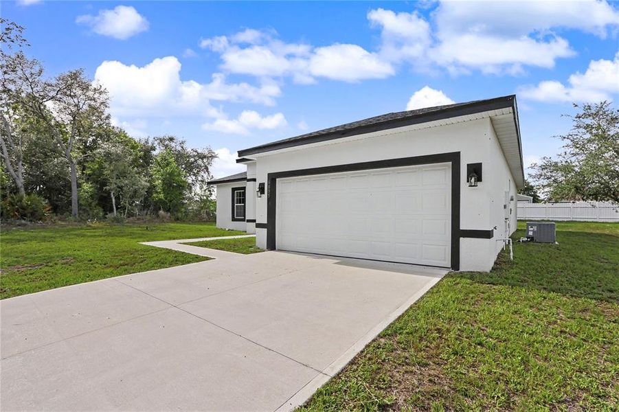Front exterior of a new home in , Ocala, FL, highlighting curb appeal (Image 30).