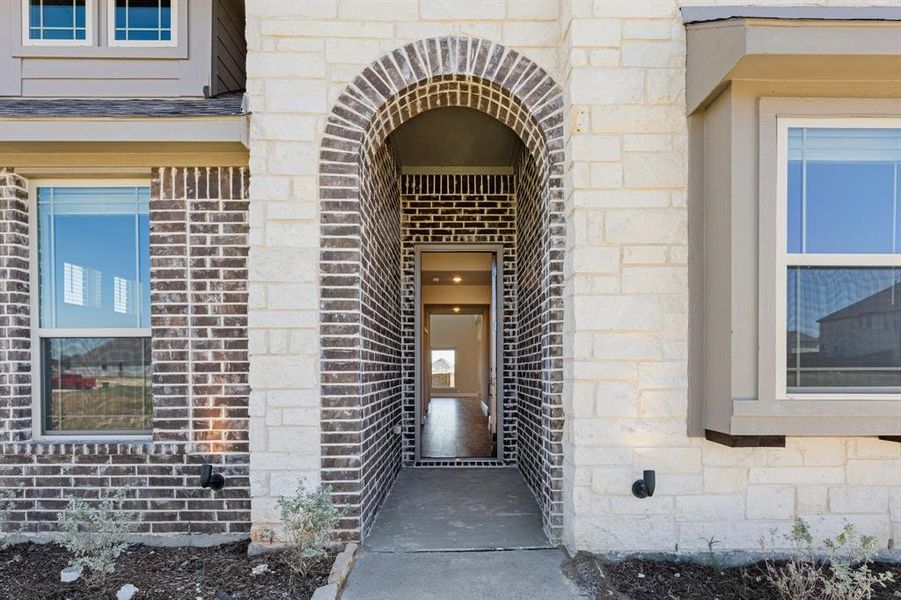 Exterior details and patio area of a home in Wildcat Ridge Phase 3, Godley (Image 27).