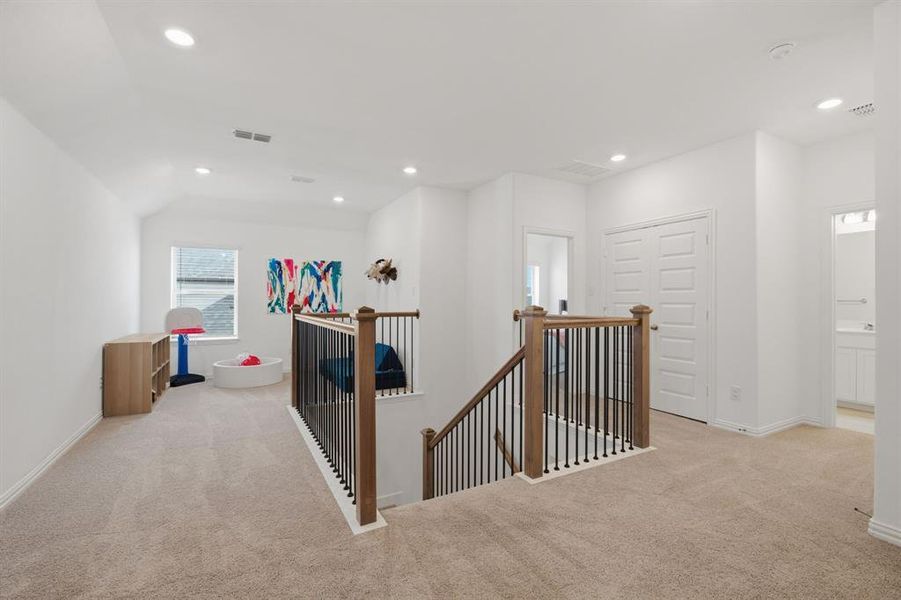 Flexible upstairs space ideal for a playroom, game room, media area, or study zone. This layout gives buyers the extra living space new construction shoppers are looking for.