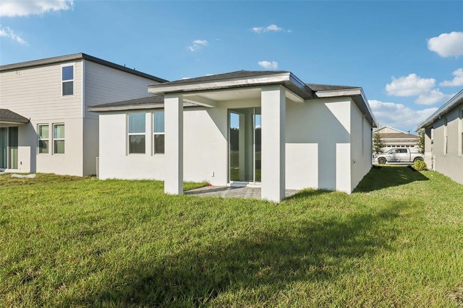 Exterior details and patio area of a home in The Reserve at Hammock Oaks - Classic Series, Lady Lake (Image 19). Exterior details and patio area of a home in The Reserve at Hammock Oaks - Classic Series, Lady Lake (Image 19).