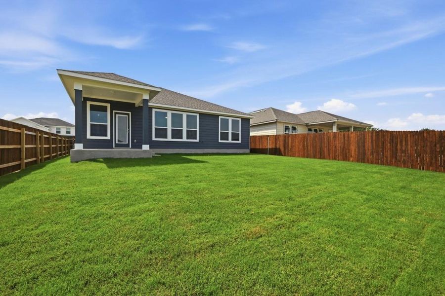 Exterior details and patio area of a home in Watermill-Classic Collection, Uhland (Image 3).