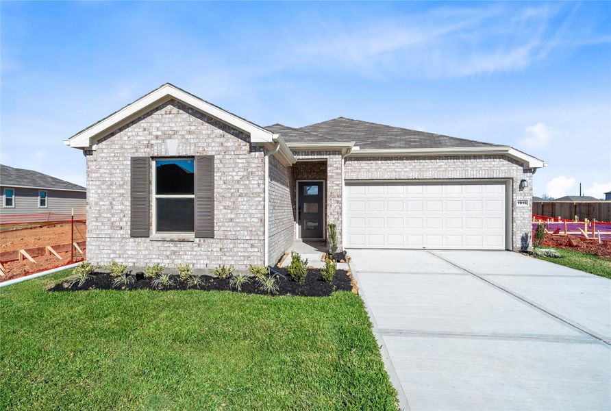 Front exterior of a new home in Olympia Falls, Fresno, TX, highlighting curb appeal (Image 2). Front exterior of a new home in Olympia Falls, Fresno, TX, highlighting curb appeal (Image 2).