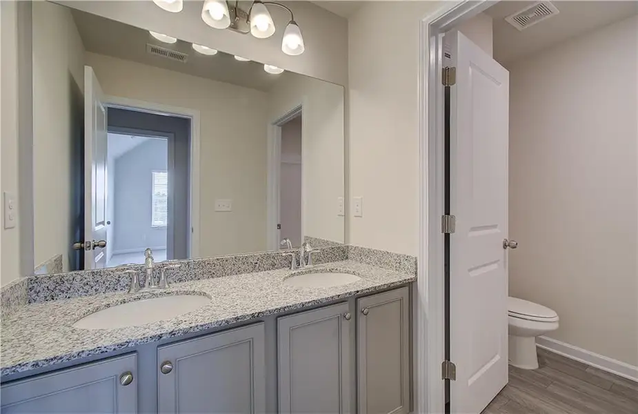 Furnished interior view inside a new home in Alcovy Village, Lawrenceville (Image 11).