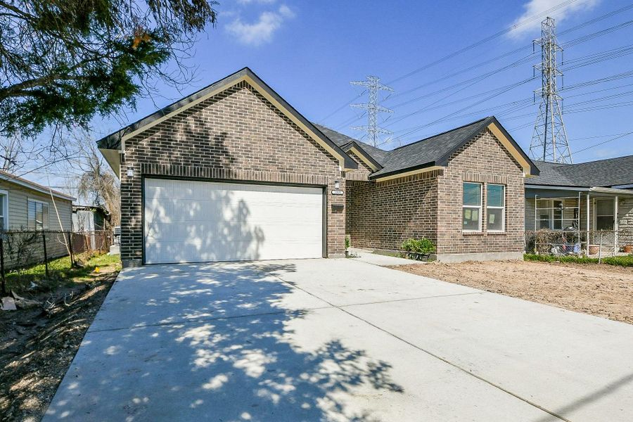Front exterior of a new home in , Galena Park, TX, highlighting curb appeal (Image 27).
