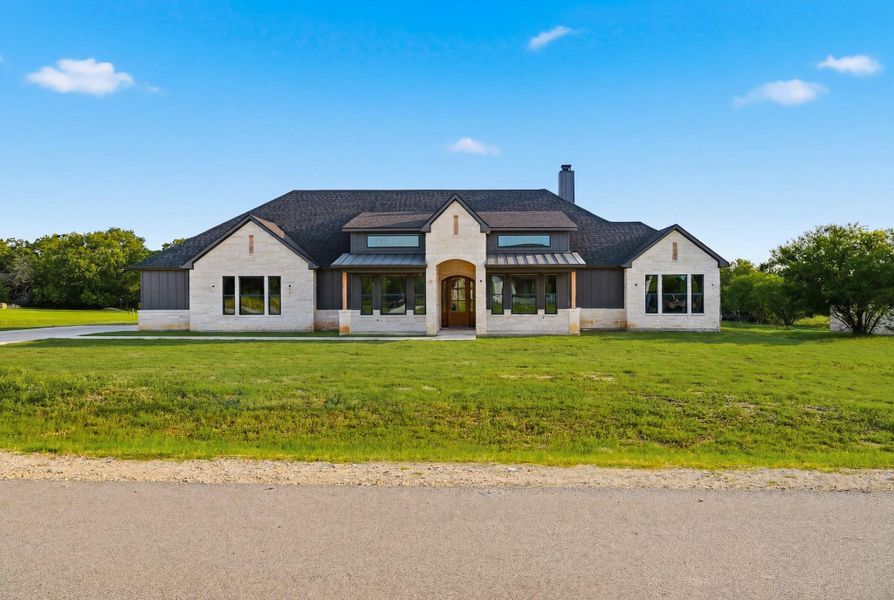 Front exterior of a new home in , Bryan, TX, highlighting curb appeal (Image 11).