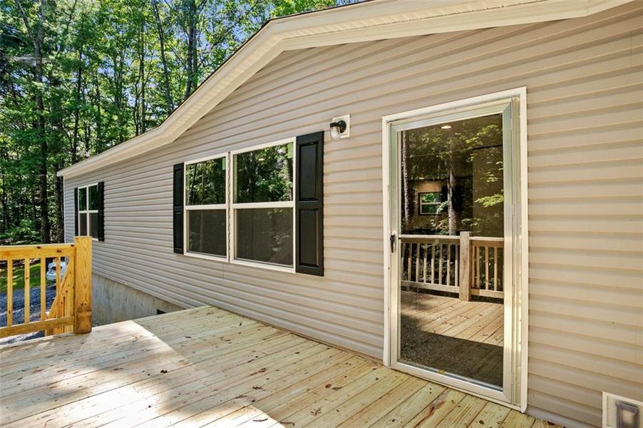 Exterior details and patio area of a home in , Ellijay (Image 20).