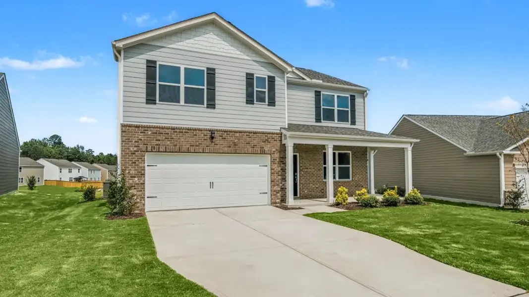 Front exterior of a new home in Anderson Farm, Wendell, NC, highlighting curb appeal (Image 2).
