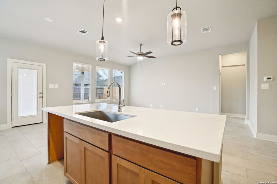 Furnished interior view inside a new home in Estancia Ranch - Classic Series, San Antonio (Image 8).