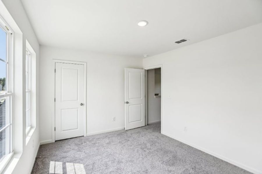 A room with white doors.