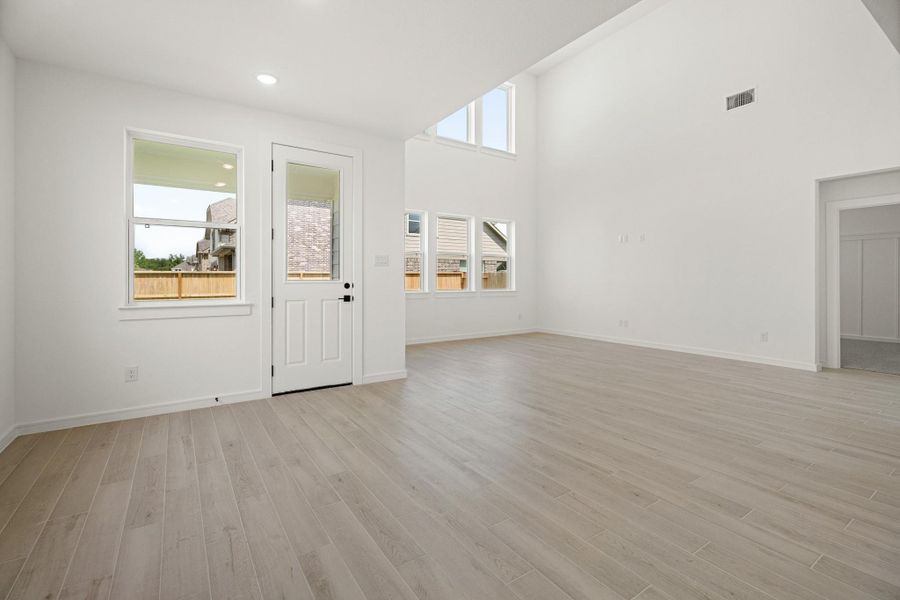 Bright open great room and dining area (*Photo not of actual home and used for illustration purposes only.) Bright open great room and dining area (*Photo not of actual home and used for illustration purposes only.)