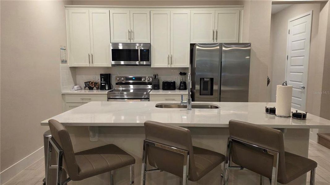 Furnished interior view inside a new home in , Reunion (Image 5).