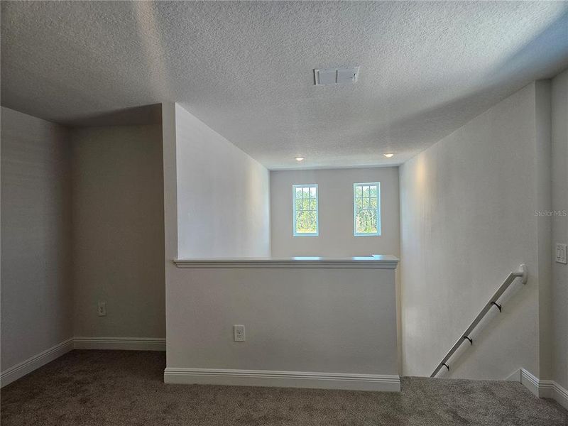 Spacious, unfurnished interior of a new home in The Reserve at Hammock Oaks - Classic Series, Lady Lake (Image 22).