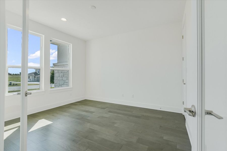 Representative unfurnished interior of a home built from the Vanderpool II by Giddens Homes in Whispering Wind, Bertram (Image 70).