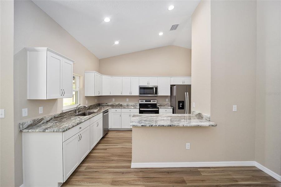 Furnished interior view inside a new home in , Dunnellon (Image 6).