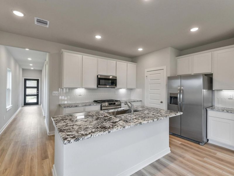 Furnished interior view inside a new home in Windmill Estates, Magnolia (Image 6).