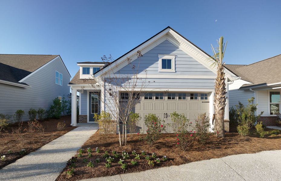 Front exterior of a new home in Del Webb Savannah at Heartwood, Richmond Hill, GA, highlighting curb appeal (Image 30). Front exterior of a new home in Del Webb Savannah at Heartwood, Richmond Hill, GA, highlighting curb appeal (Image 30).
