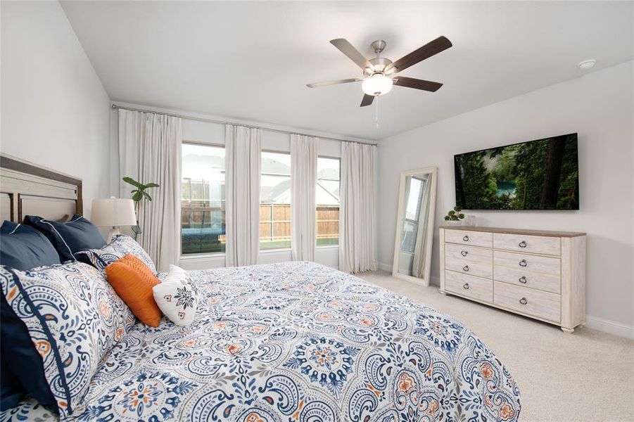 A wall of windows fills the room with natural light, while the expanded layout provides ample space for a sitting area, reading nook, exercise equipment, or private retreat. A wall of windows fills the room with natural light, while the expanded layout provides ample space for a sitting area, reading nook, exercise equipment, or private retreat.