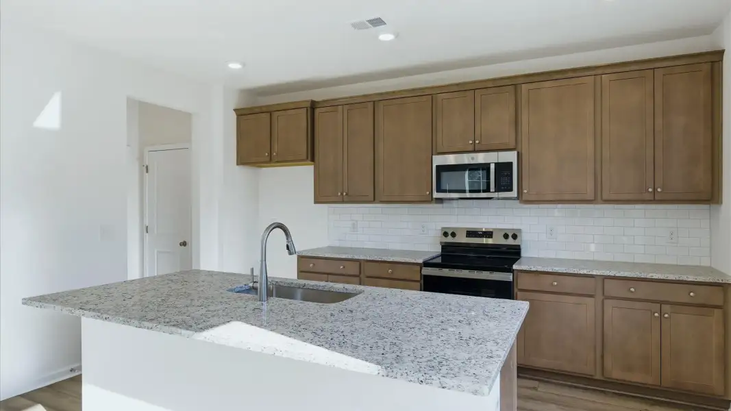 Furnished interior view inside a new home in Creekside at Andrews, Summerville (Image 7).