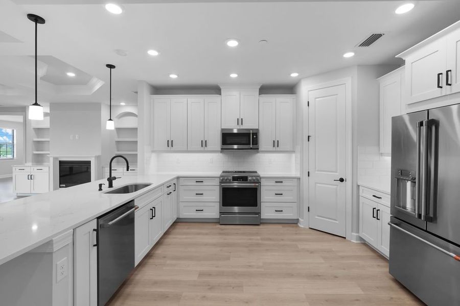 Furnished interior view inside a new home in Esplanade by the Islands Coach Homes, Naples (Image 3).