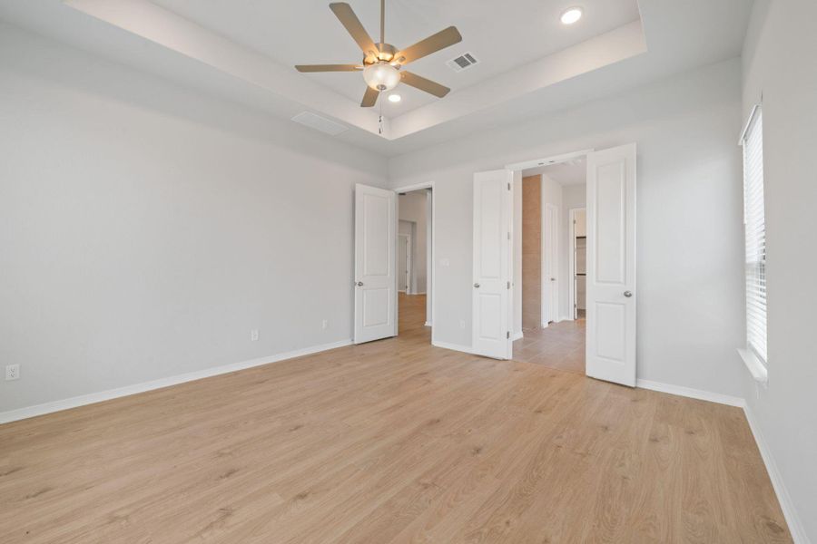 Primary Bedroom with tray ceiling