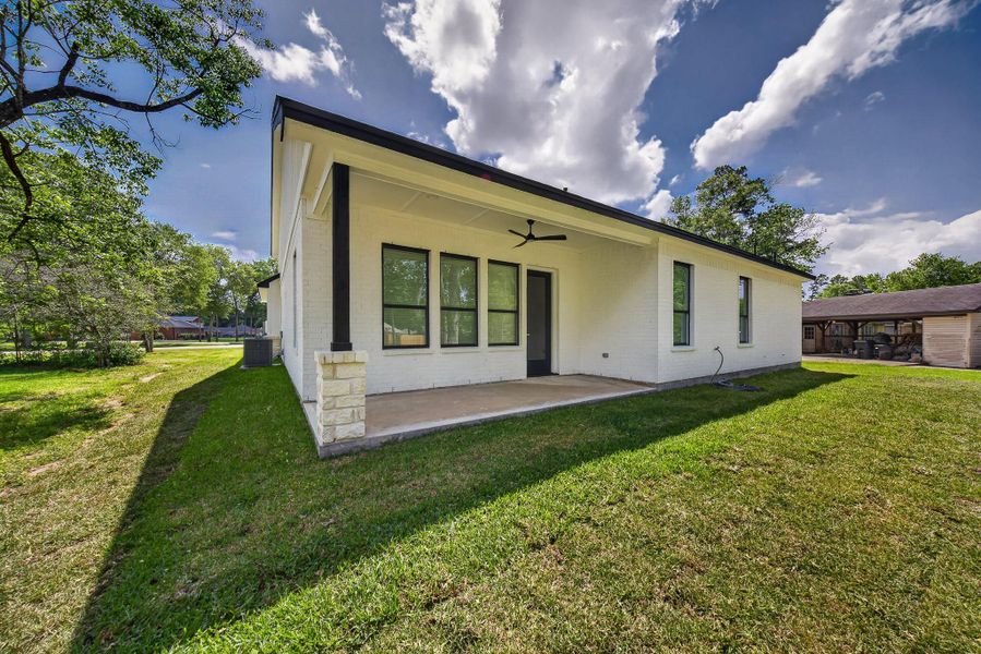 Exterior details and patio area of a home in , New Caney (Image 28).